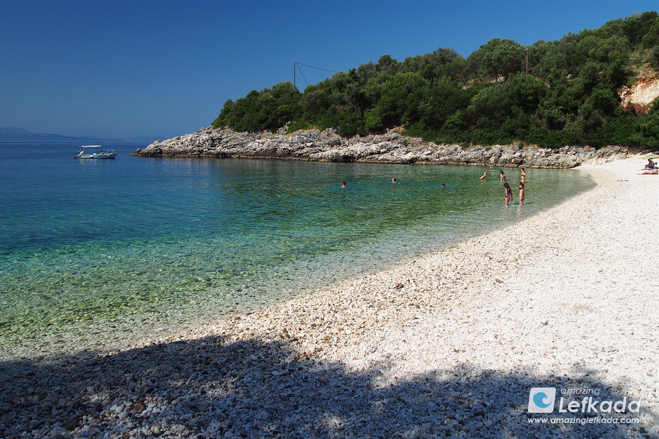 White pebbles and emerald sea of Amoussa beach for snorkeling