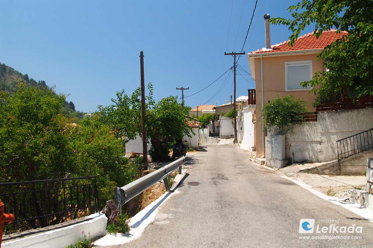 Main street with apartments and studios in Kalamitsi village