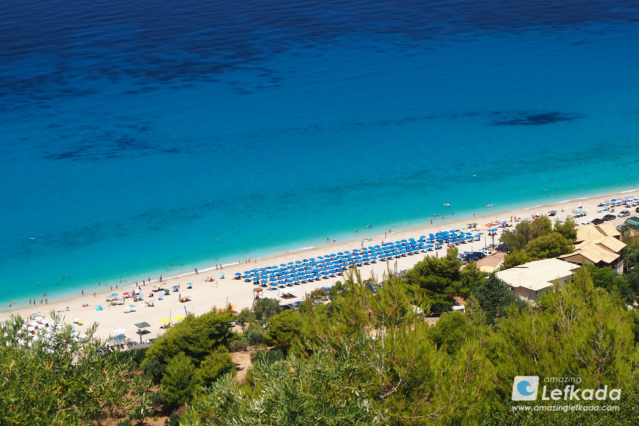 Panoramic view to Paralia Kathisma beach with restaurants and sunbeds