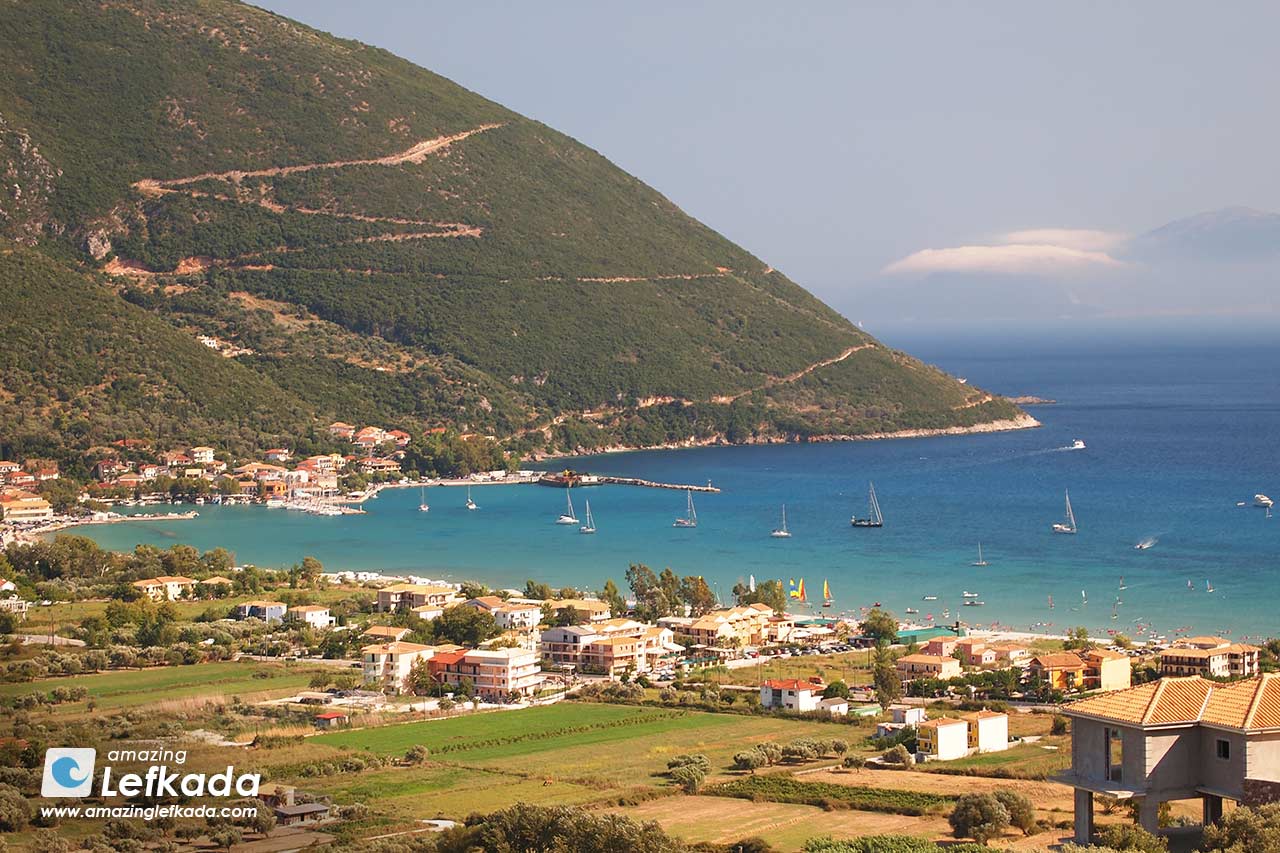 Vasiliki beach view with surfers