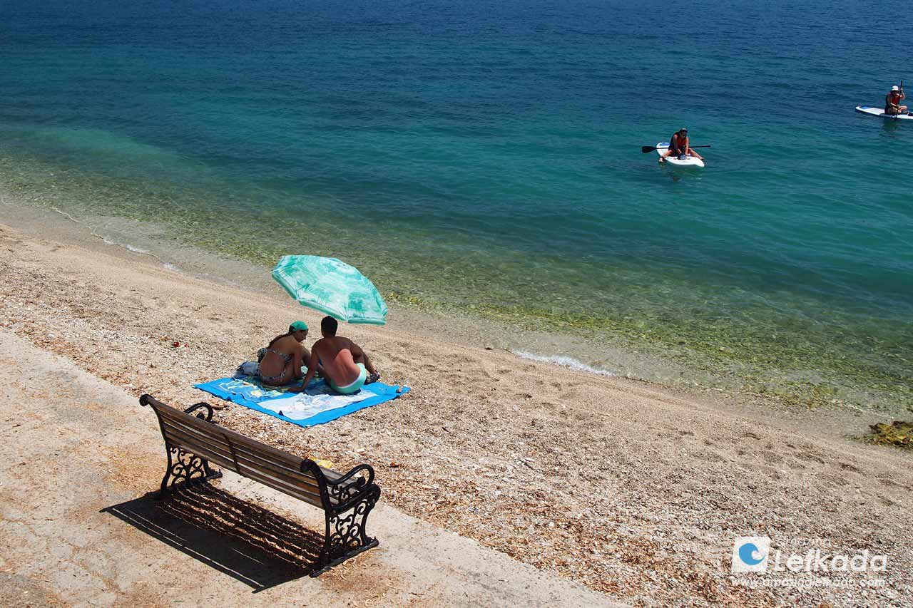 Lygia beach with swimmers and snorkelers, recommended for smaller children in Lefkada Island