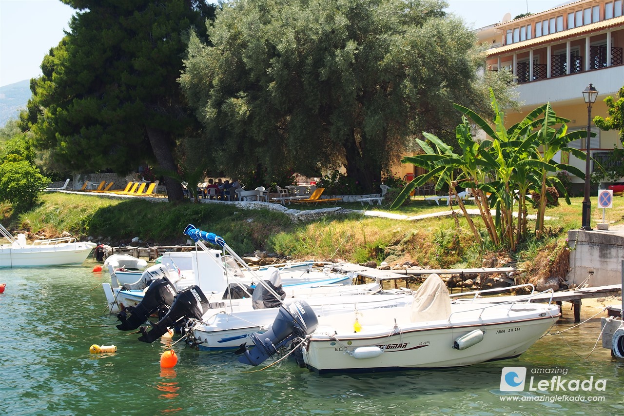 Coastline with boats in Perigiali small port