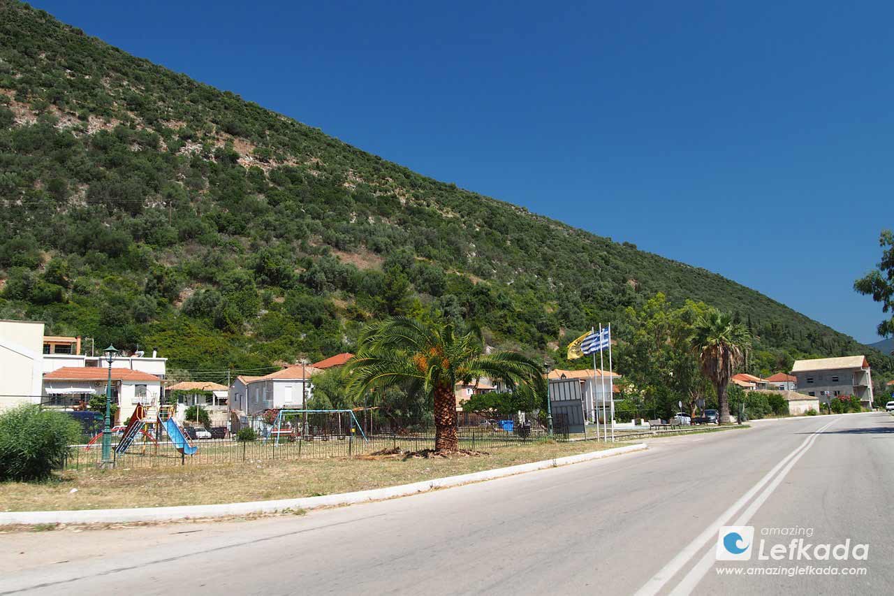 Area of Vlicho witjh restaurants, playground, green hills of Lefkada