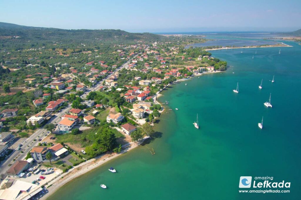 Ligia beach and village by aerial drone photo Ligia beach and village by aerial drone photo in Lefkada Island