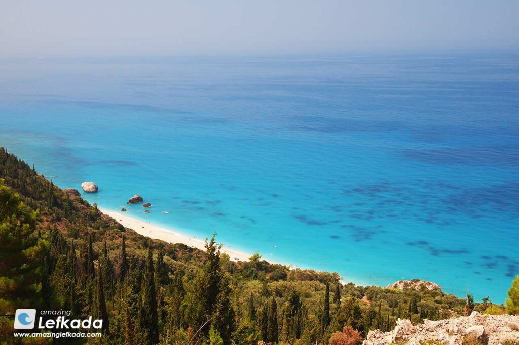 View to Megali Petra beach from the heights of Kalamitsi View to Megali Petra beach from above