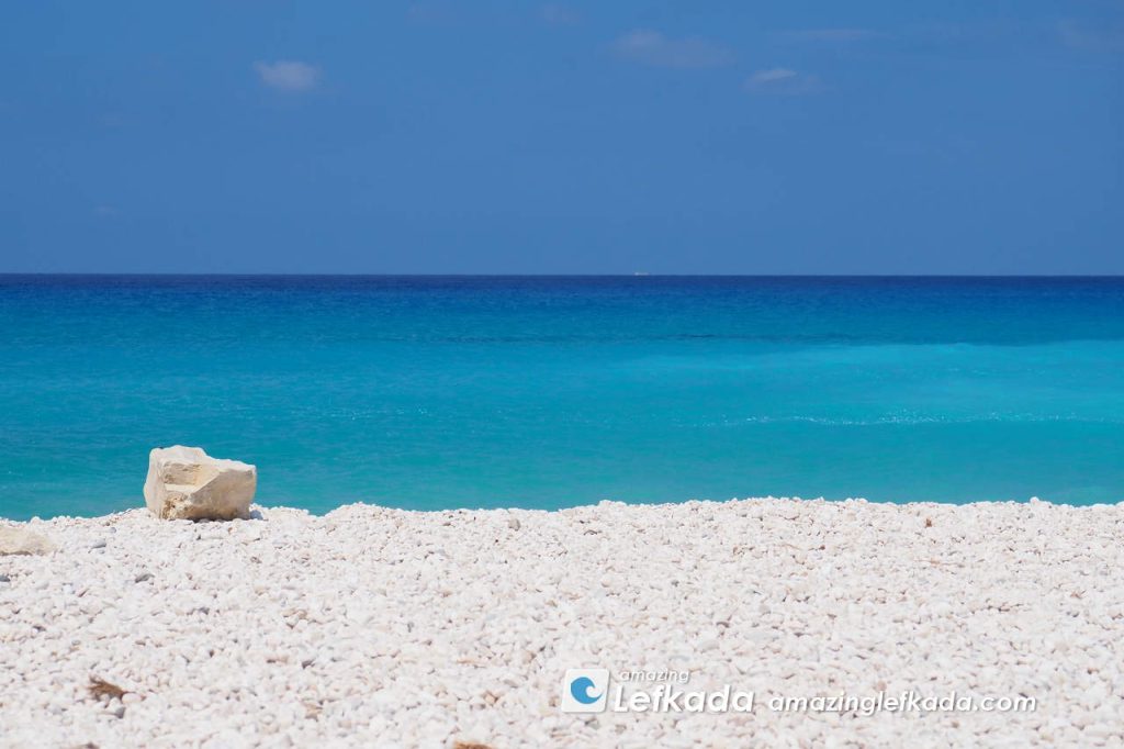 Best beaches in Egkremni with white coarse sand