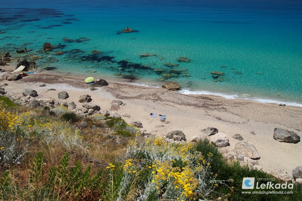 Crystal clear calm sea of Paralia Pefkoulia The southern side of Paralia Pefkoulia