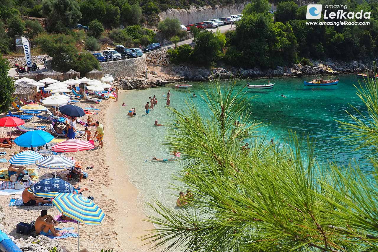 Sandy seabed, sunbeds and shallow waters of Afteli beach
