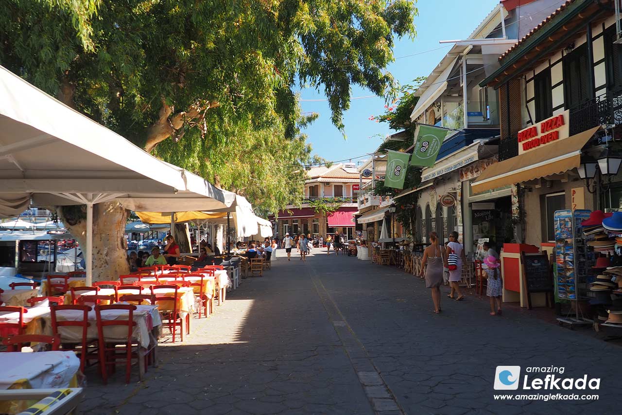 Main street and promenade of Vasiliki near port with best restaurants