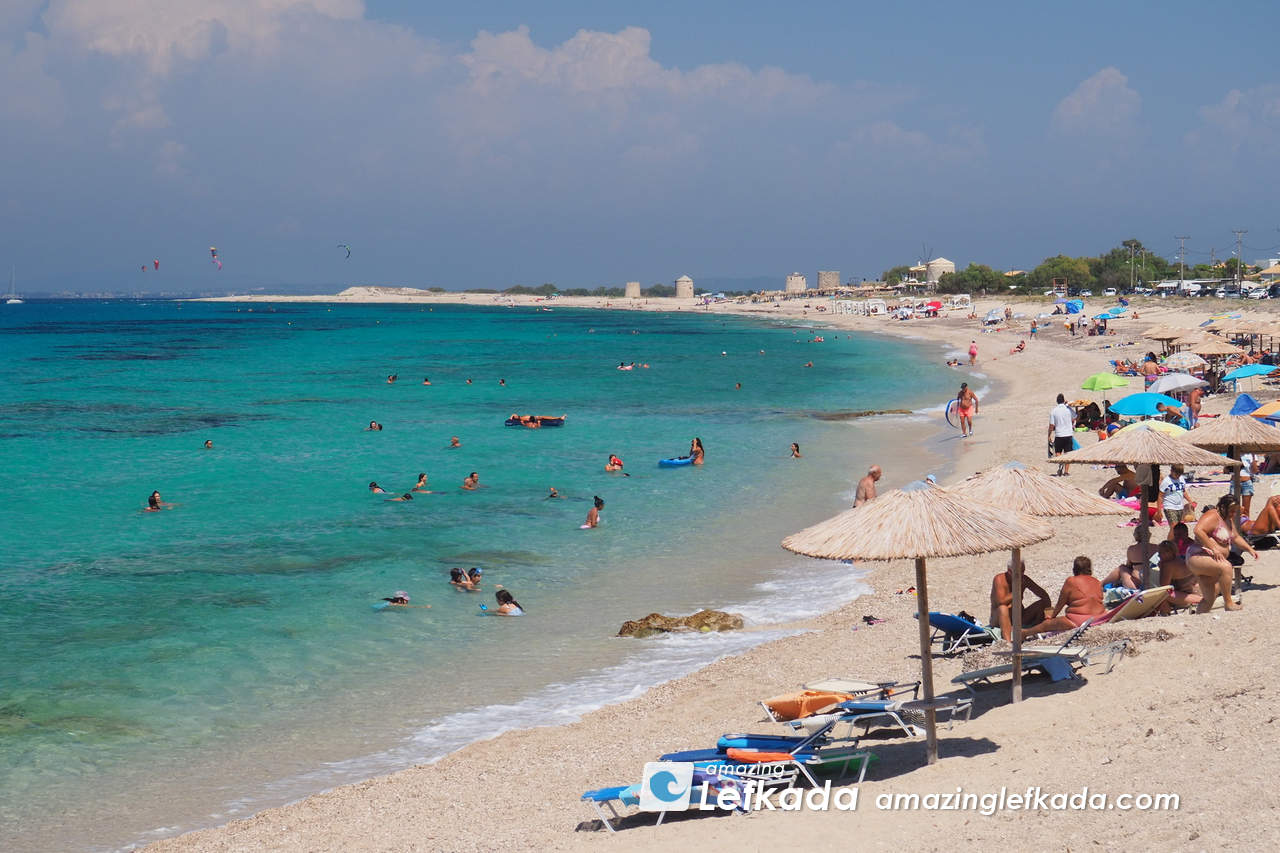 Sunbeds for rent at shallow sea