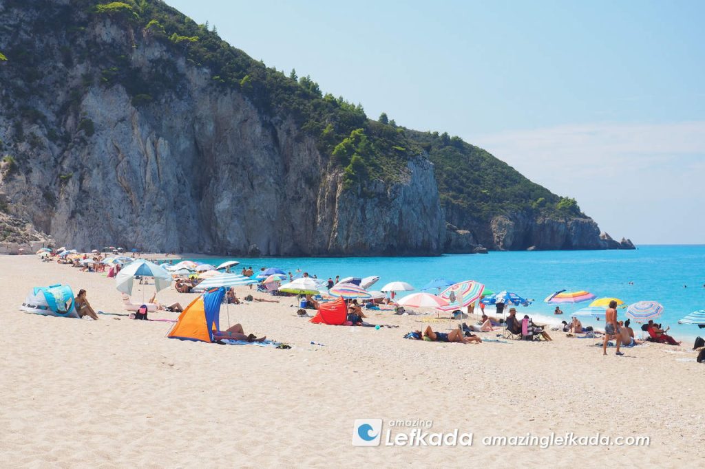 Sand of Mylos with blue Ionian Sea